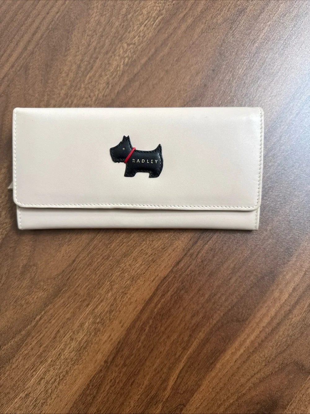 RADLEY LONDON Cream Wallet with Black Scottie and Red Collar Accent